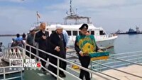 ورود کاروان زیر سایه خورشید حامل پرچم متبرک حرم مطهر رضوی به کیش